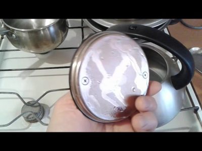 How to remove black plaque from stainless steel